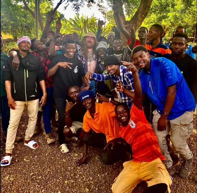 NG Bailey safety advisor Matthew Bailey on his trek up Mt Kilimanjaro with a crowd of people he met along the way.