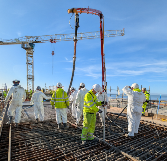 Roof slab concrete pour gets underway